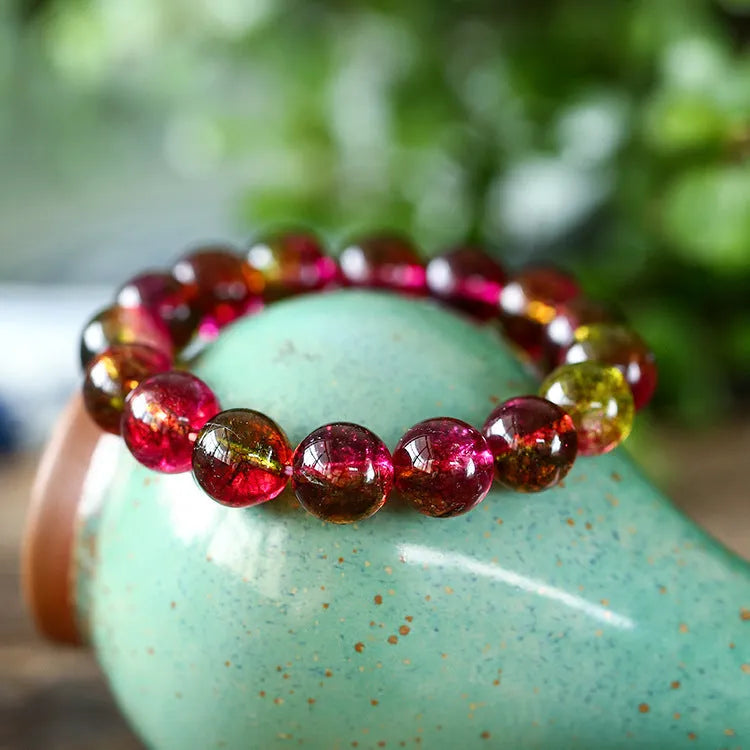 Women's handmade watermelon crystal bead bracelet showing options in different bead sizes.