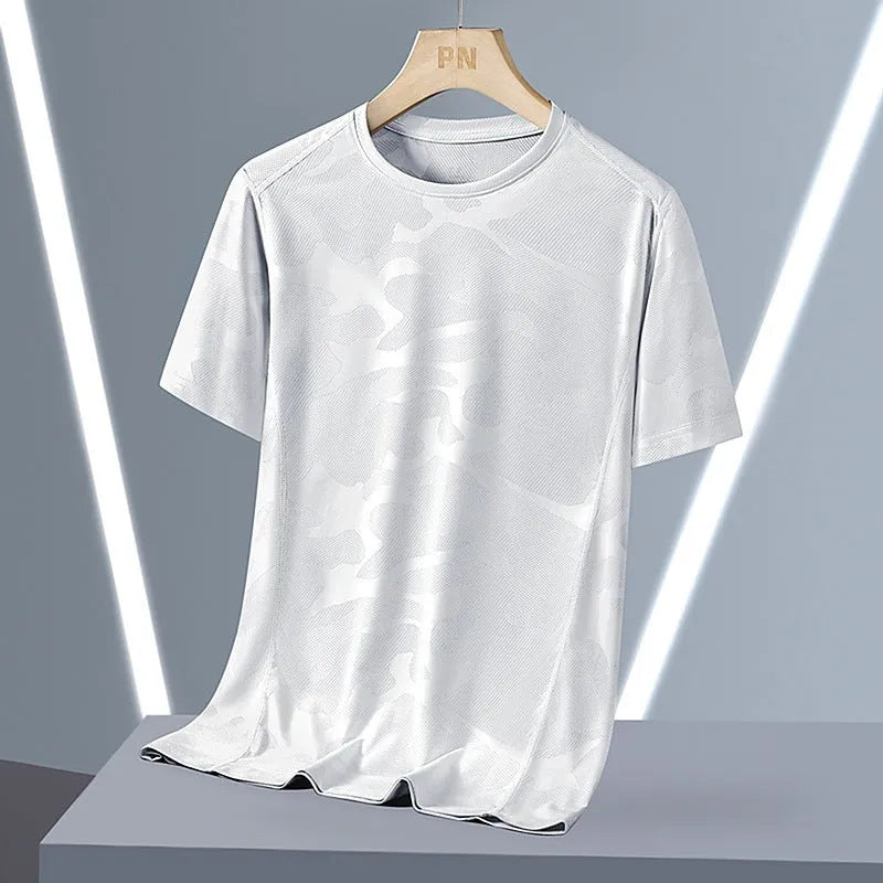 Men's camouflage pattern nylon summer t-shirt with round neck and short sleeves in loose fit.