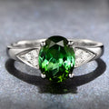 A court style ladies' ring with an inlaid natural zircon gemstone, shown in a choice of heart, water drop, or bell patterns.