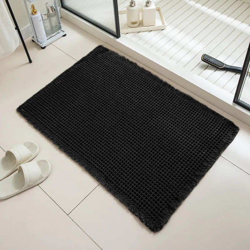 Absorbent non-slip bathroom carpet with checkered pattern in a neutral colour