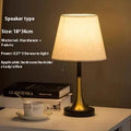 Retro alloy bedside lamp with speaker-style shade and dimming control