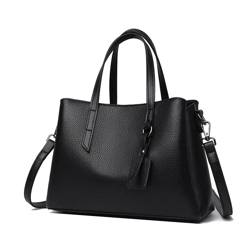 Women's cowhide leather shoulder handbag in horizontal square shape with contrast stitching