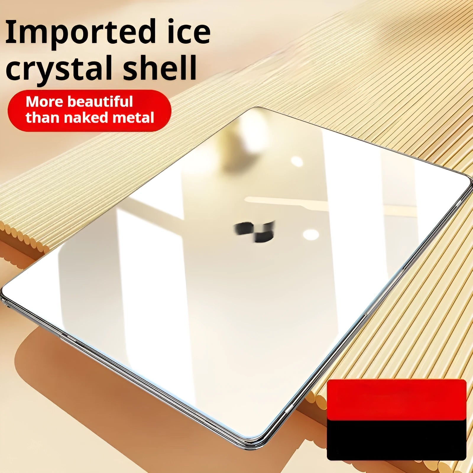 Transparent plastic protective case for a MacBook laptop on a table.