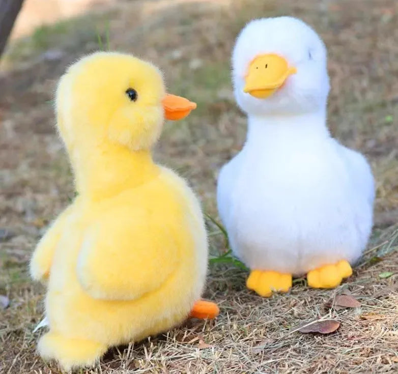 Simulation plush small yellow duck 17cm tall with soft fabric and sound feature for children