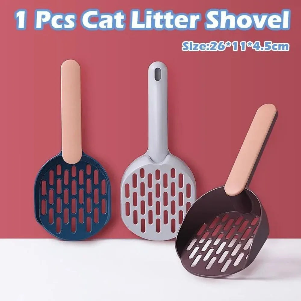 Blue plastic cat litter scoop with sifting holes for cleaning a litter box.