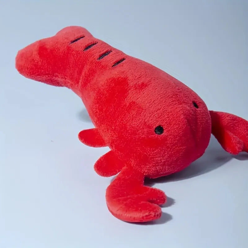 Red lobster-shaped squeaky dog toy with crab-lobster design measuring 12.5cm long