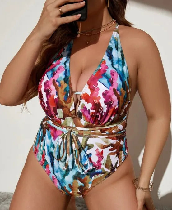 Purple women's halter swimsuit with solid colour briefs on hanger