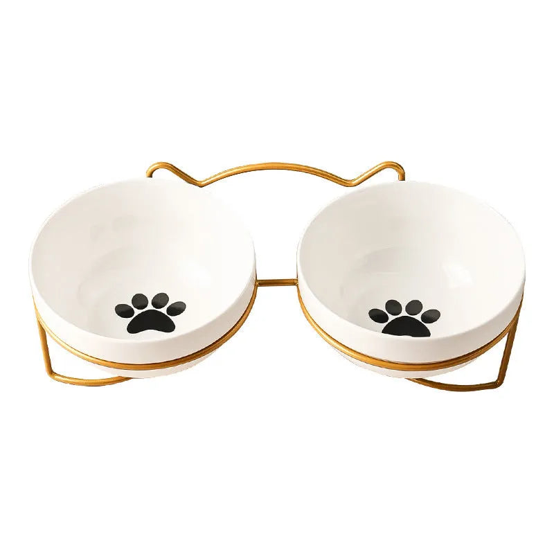 White ceramic cat bowl with cat paw pattern and black iron frame with cat ears