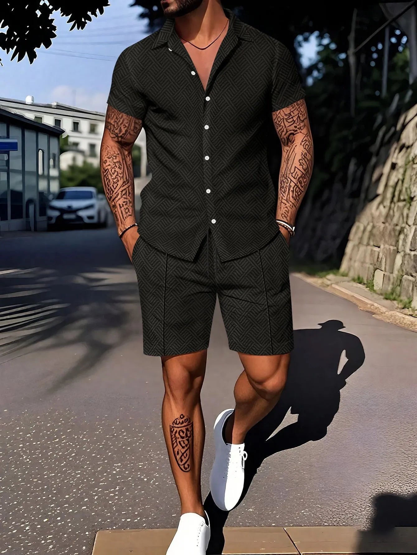 Man wearing a digitally printed short sleeve casual suit set in a neutral colour.