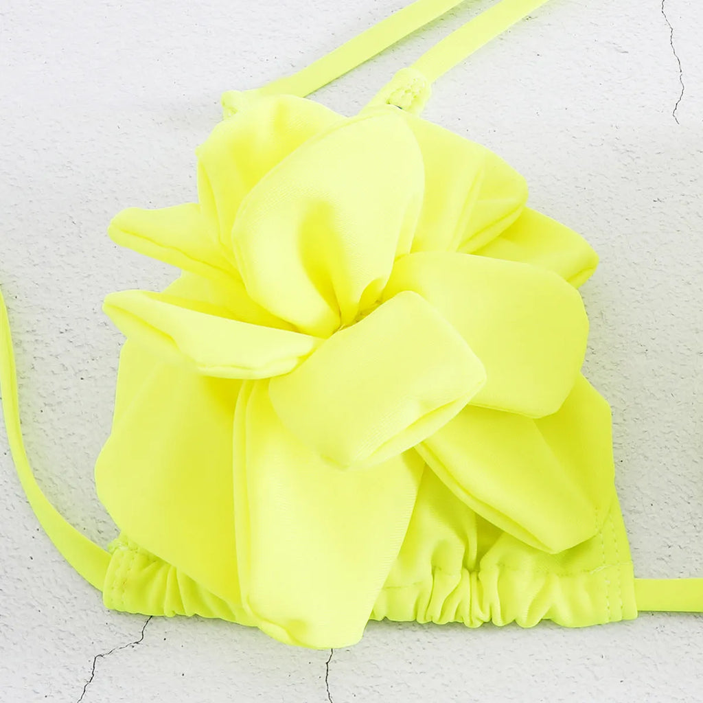Women's 3D flower low waist bikini swimsuit in solid colour with backless briefs style.