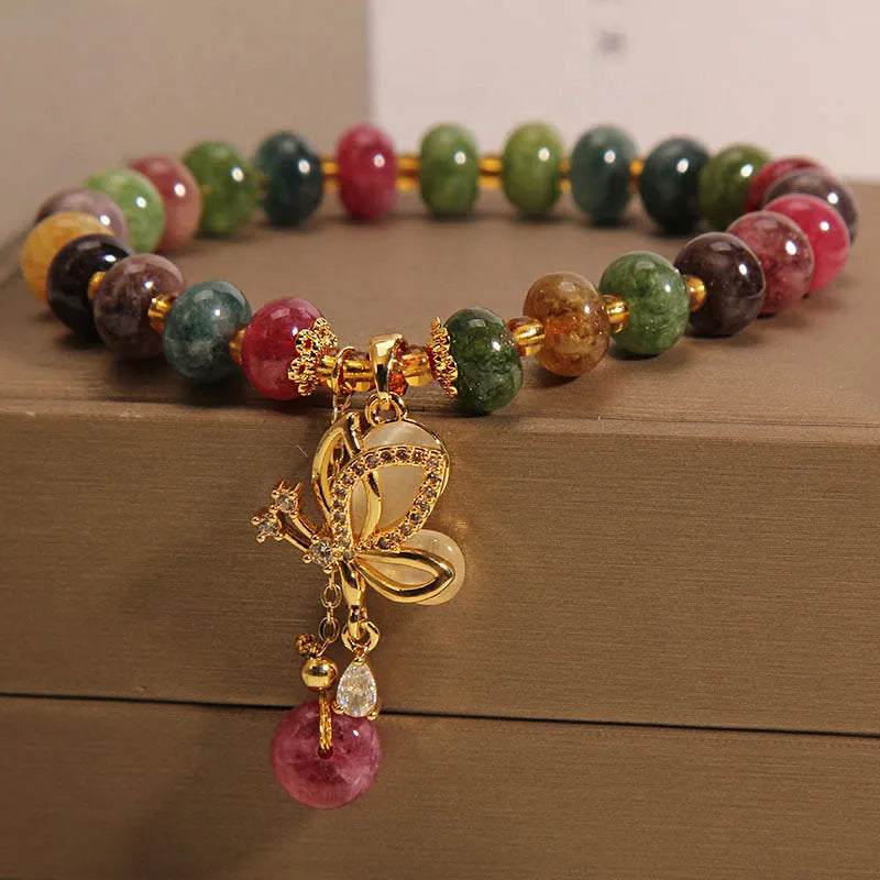 Colourful women's butterfly bracelet with tourmaline beads on alloy construction