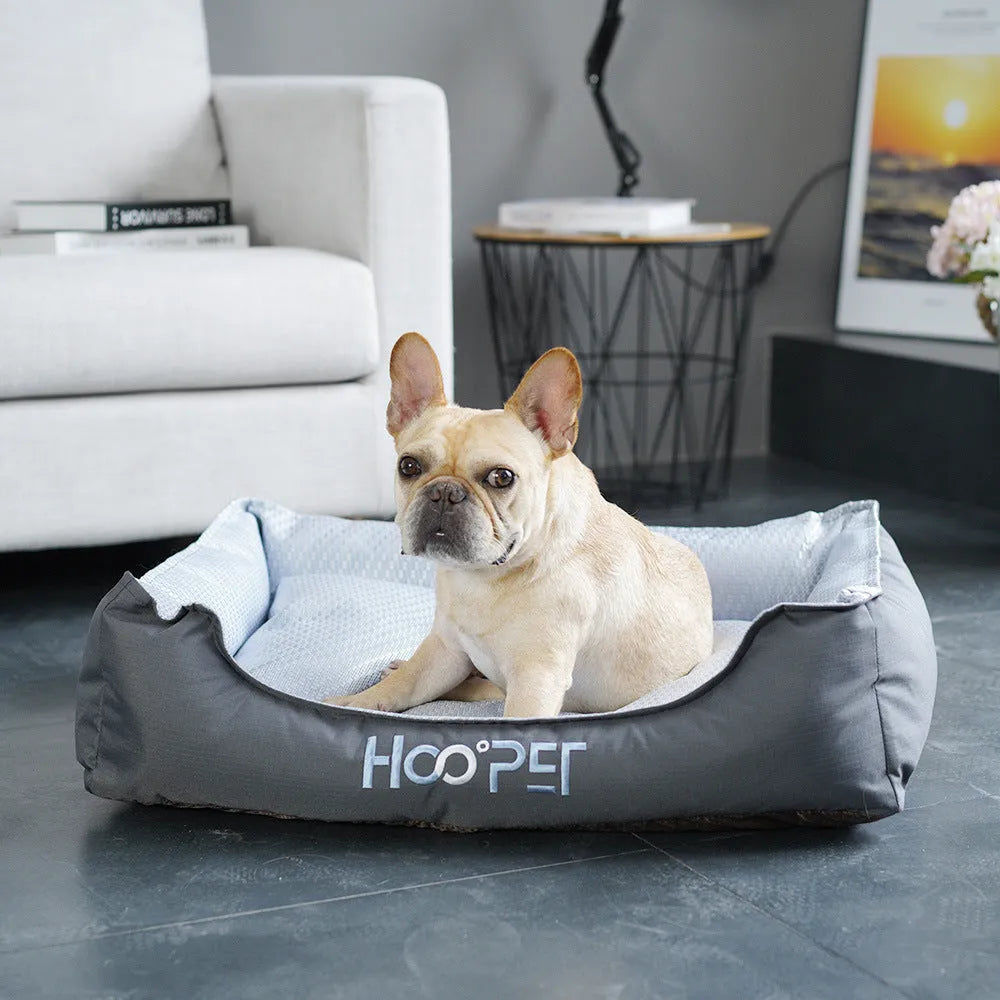 Soft grey pet bed with removable cover in small, medium, and large sizes for dogs and cats