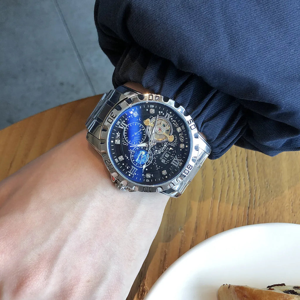 Men's silver case automatic watch with black starry luminous dial and steel belt