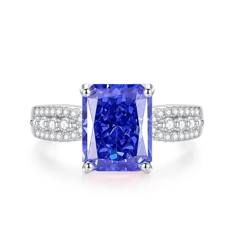 Heart-shaped sterling silver ring with a clear, faceted tan sang zircon stone.