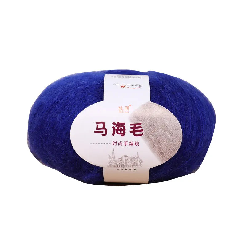 A ball of hand-woven mohair wool yarn for a DIY scarf knitting kit in one of 34 available colours.