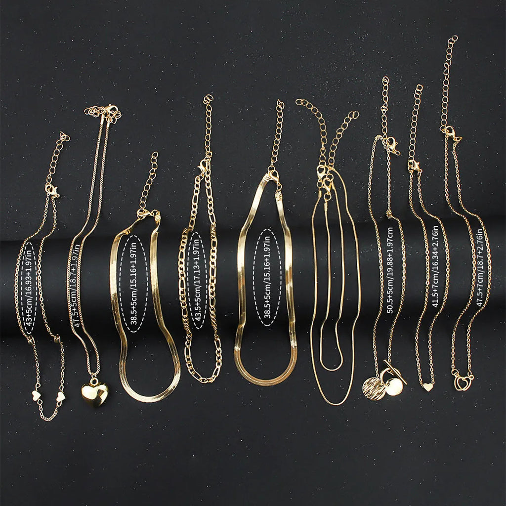 10-piece gold women's necklace set with adjustable snake bone chain and alloy pendants