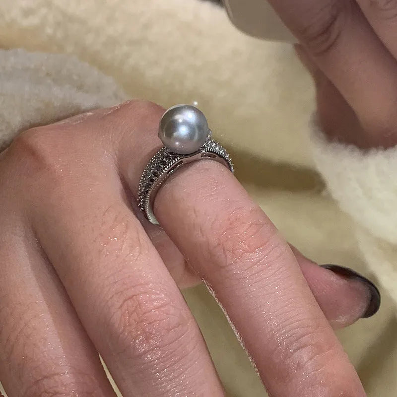 Black pearl open index finger ring with geometric copper design and adjustable opening