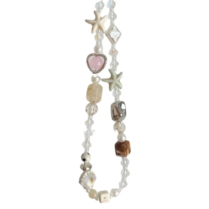 Bohemian sweetheart design mobile phone charm with beaded elements in island sweetheart colour