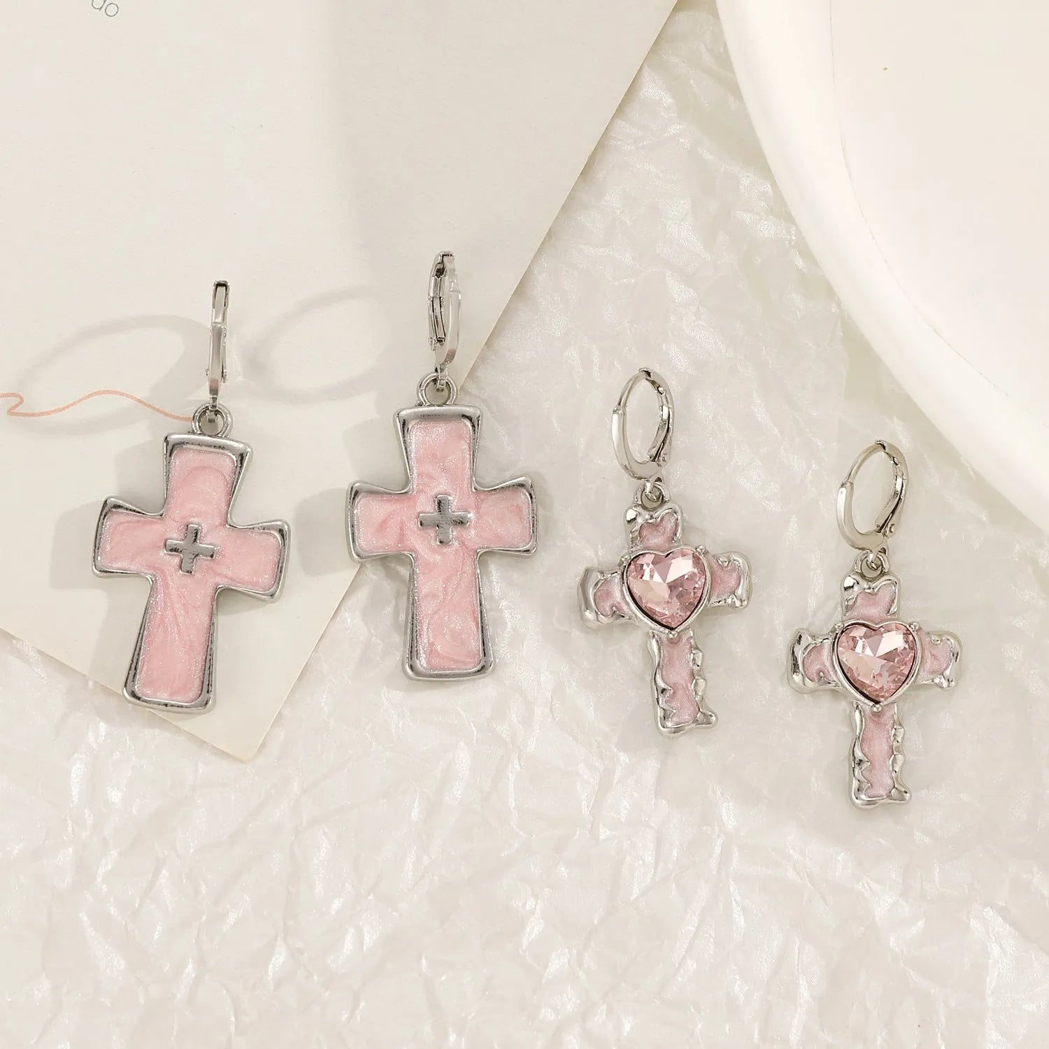 Women's alloy earrings with cross designs in white, bright black, and antique silver colour options
