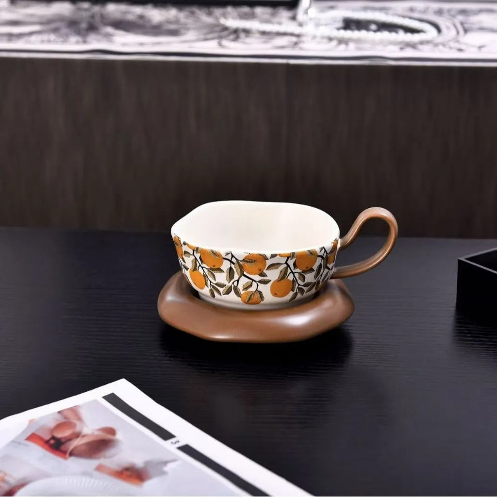 Retro style ceramic coffee cup and saucer set in black or orange colour with 210ml capacity