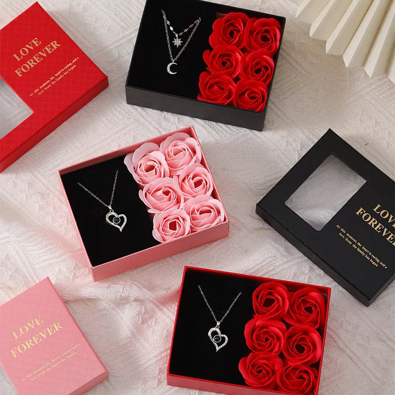 Korean style gift box containing six red soap flowers, with a handbag, for Valentine's Day gifting.