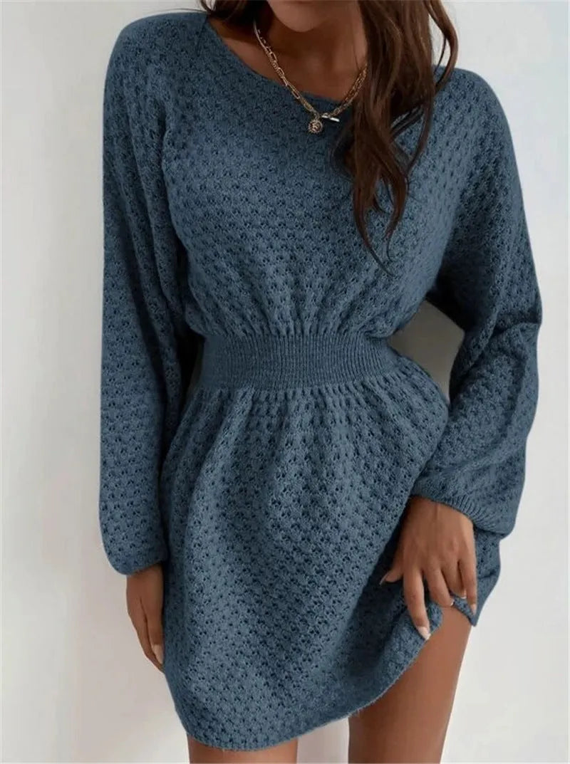 Blue knitted dress with French loose round neck, fitted waist, and hand-crocheted flower decorations