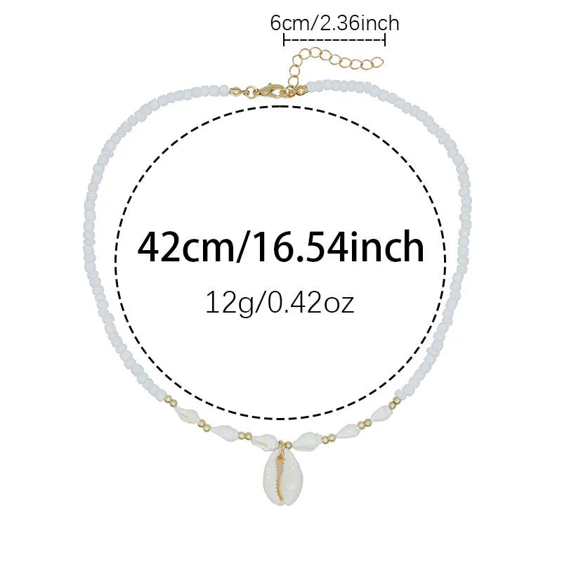 White conch shell necklace with a mother pearl pendant on a regular chain.