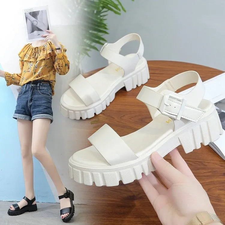 Women's beige peep toe platform sandals with an adjustable ankle-strap buckle closure.