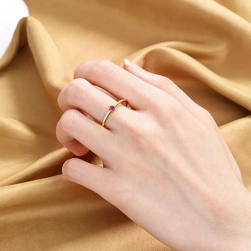 Copper geometric women's ring with single diamond centrepiece in fine circle band design