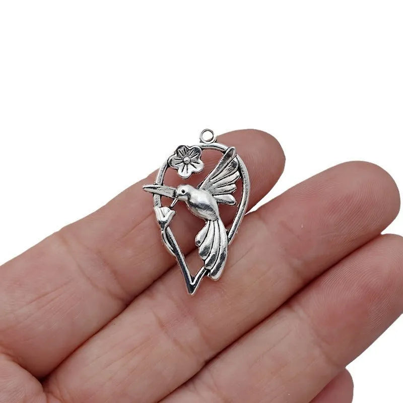 Alloy DIY pendant with a flying bird and cuckoo design, electroplated in colour P234