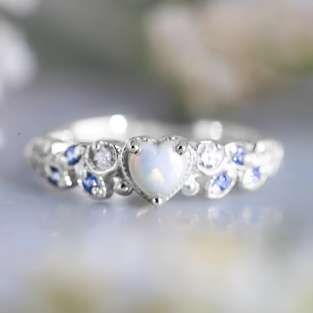 Women's peach heart alloy ring with floral opal ocean design and white electroplated finish