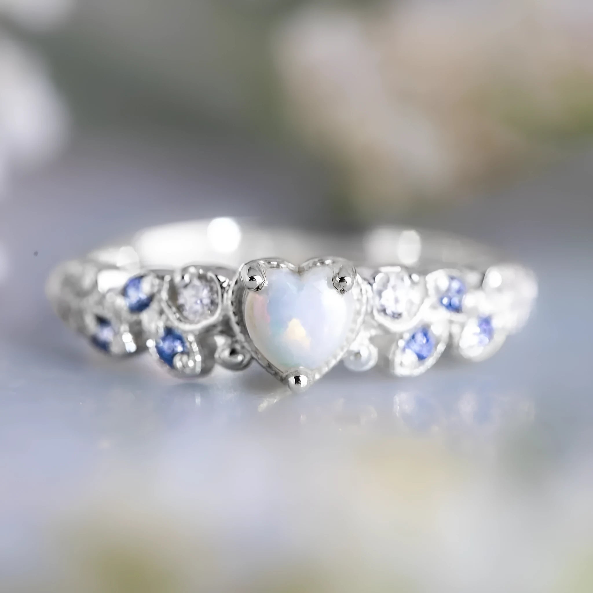 Women's peach heart alloy ring with floral opal ocean design and white electroplated finish