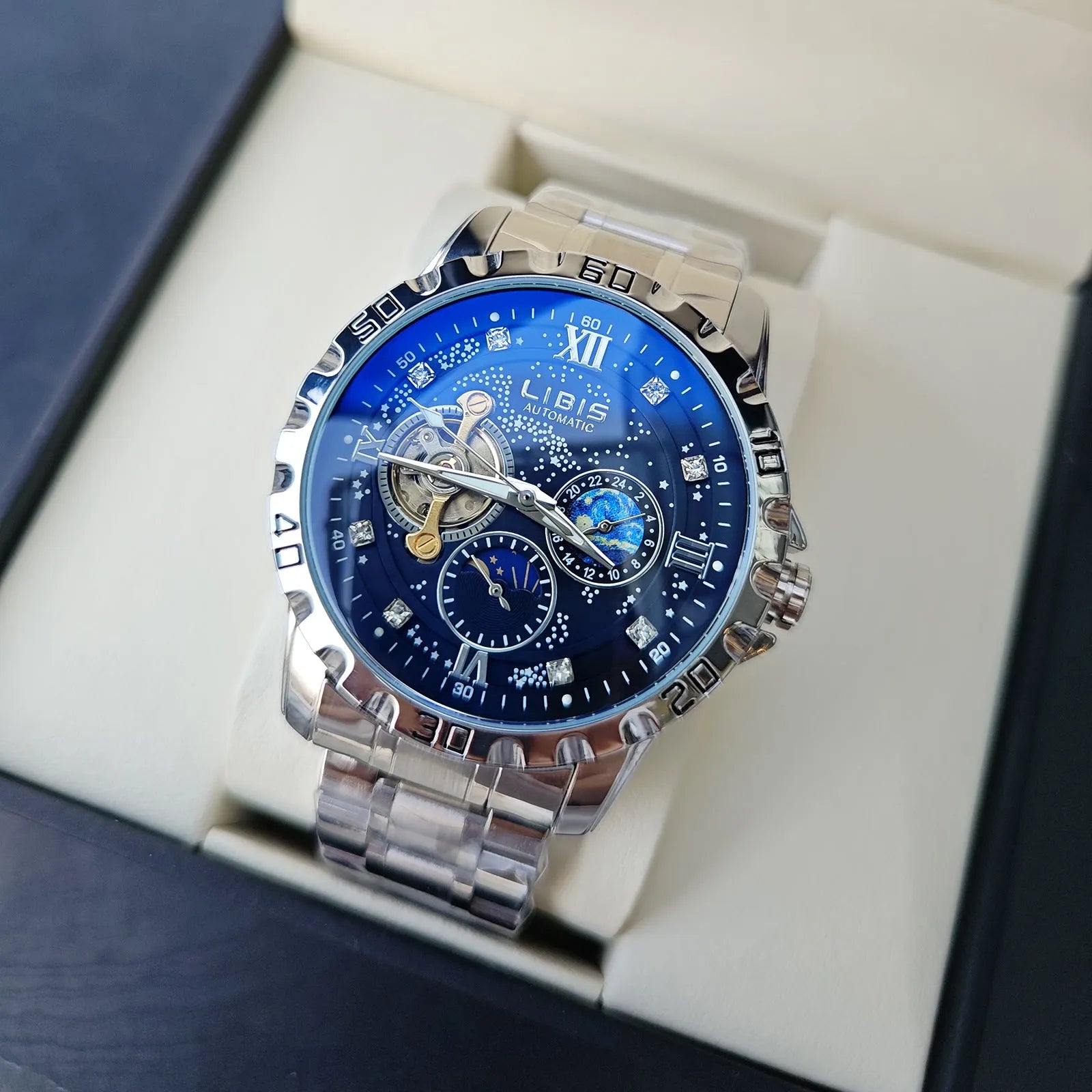 Men's silver case automatic watch with black starry luminous dial and steel belt