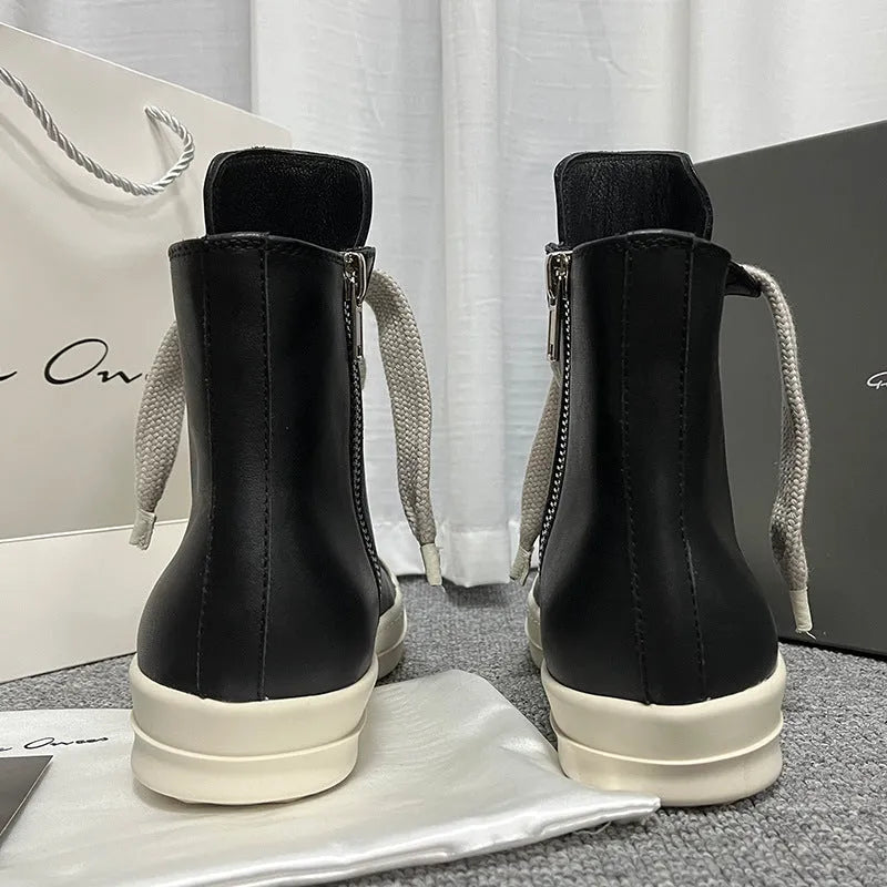 Black high-top leather casual sneakers with a side zipper and a round toe on a rubber sole.