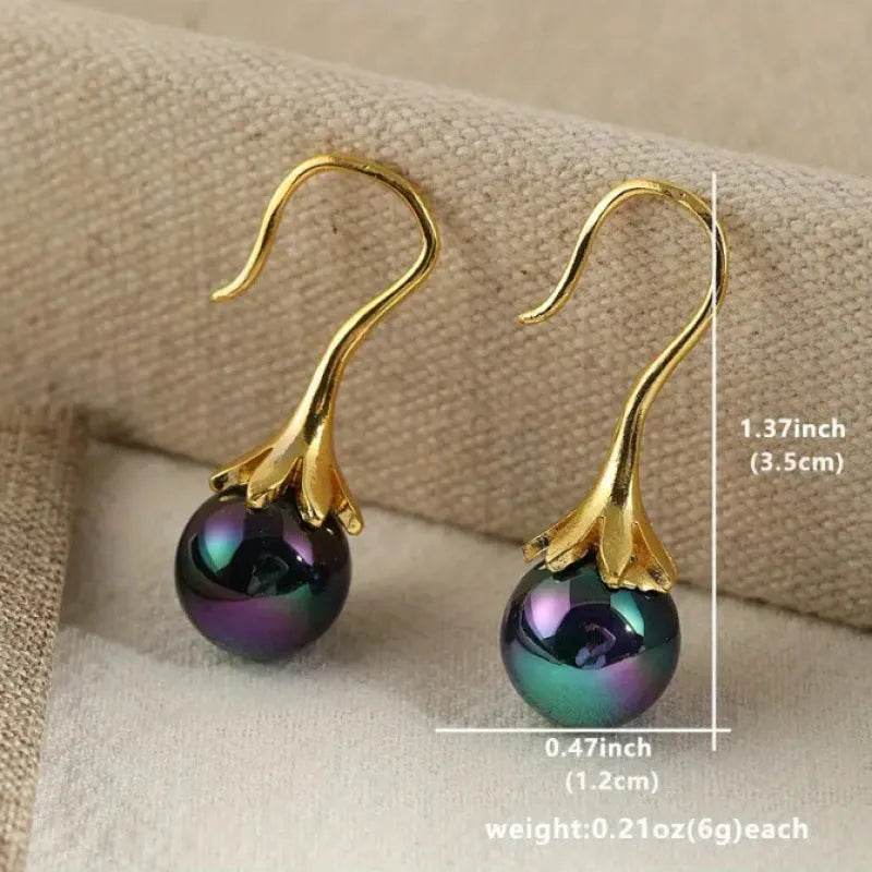 Gold electroplated retro fashion women's earrings with personalised creative design