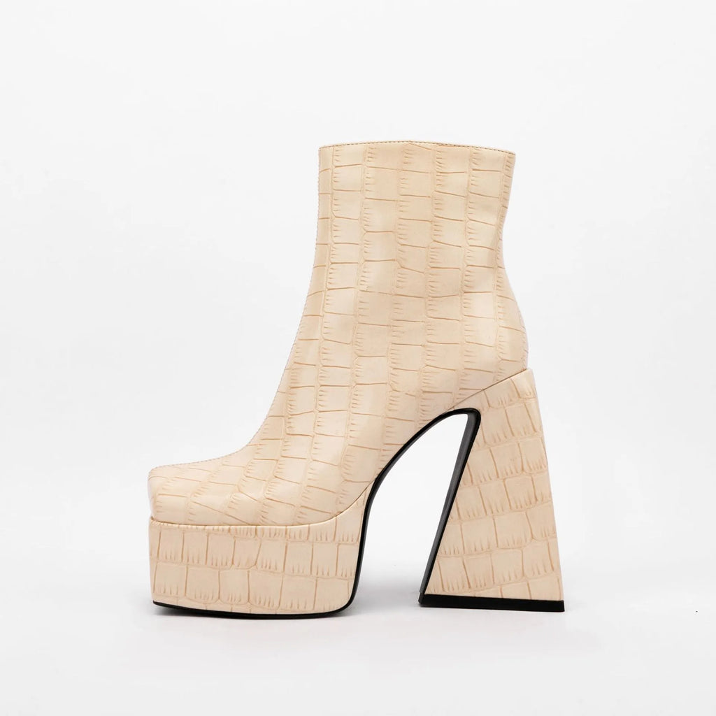 Women's artificial PU leather ankle boots in beige with a super high heel.