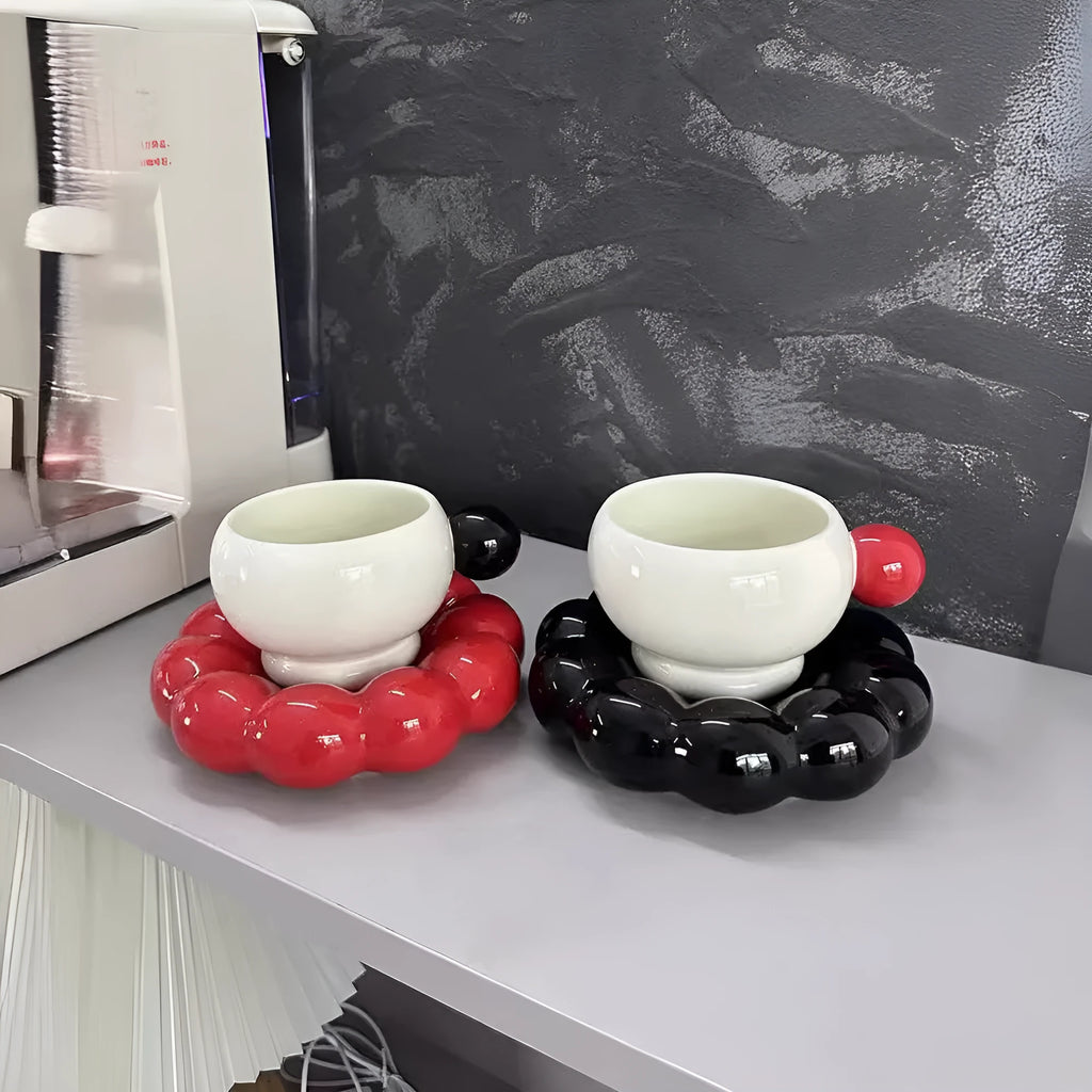 Ceramic coffee set with cup and dish in solid colour options showing simple Nordic design