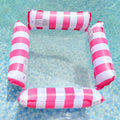 Inflatable four-tube floating deck chair with striped design and mesh seat on water.