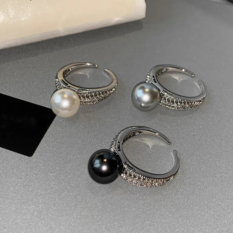 Black pearl open index finger ring with geometric copper design and adjustable opening