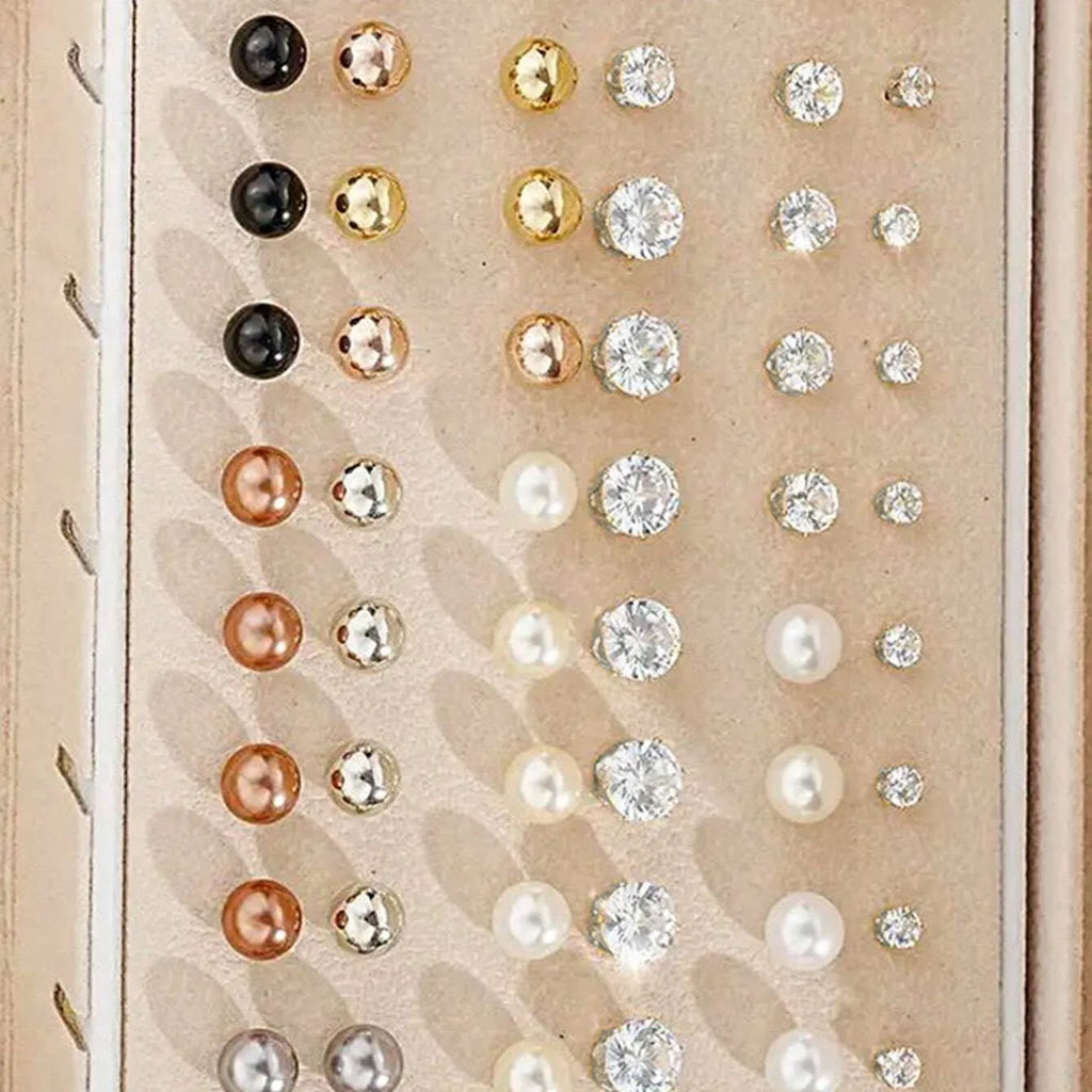 108-piece gold and yellow geometric round pearl earrings multipack on a flat surface.