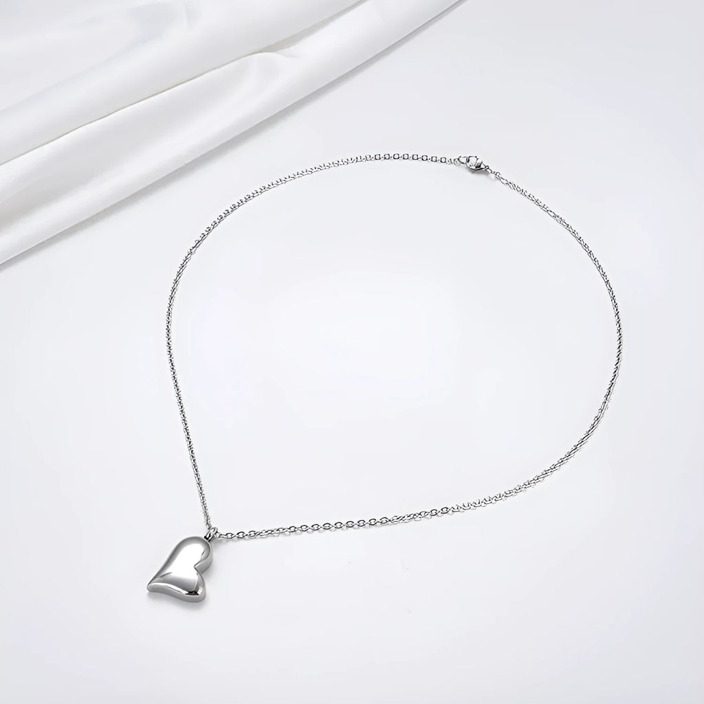 Silver stainless steel curved peach heart pendant necklace with adjustable chain length
