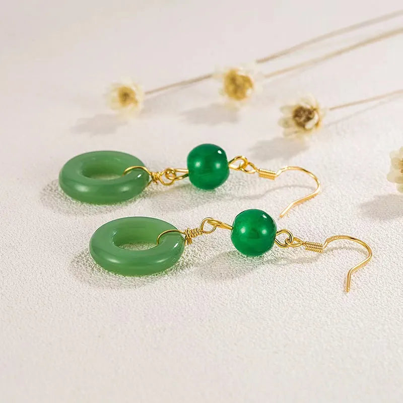 Green jade design peace buckle earrings in 14K gold colour zinc alloy