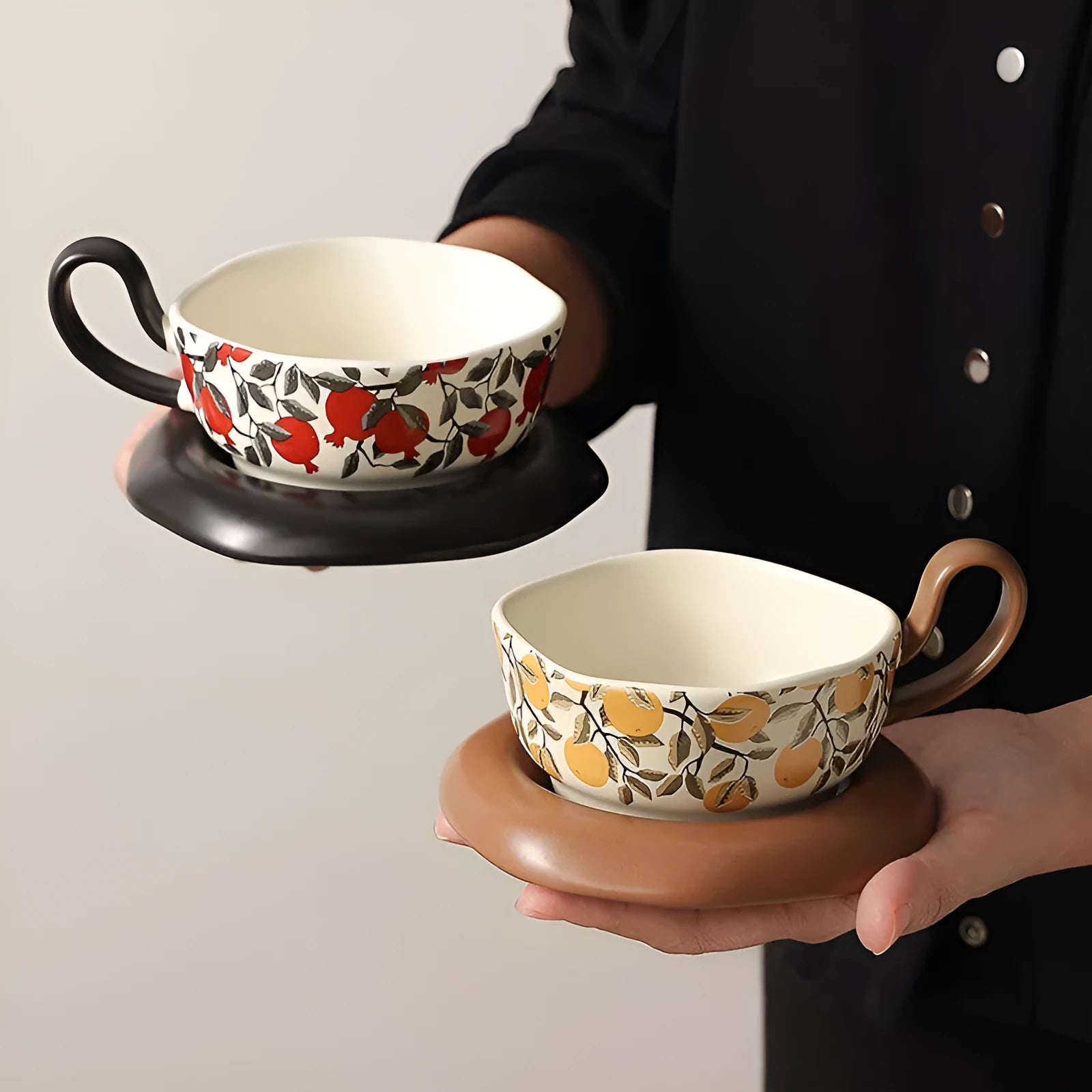 Retro style ceramic coffee cup and saucer set in black or orange colour with 210ml capacity