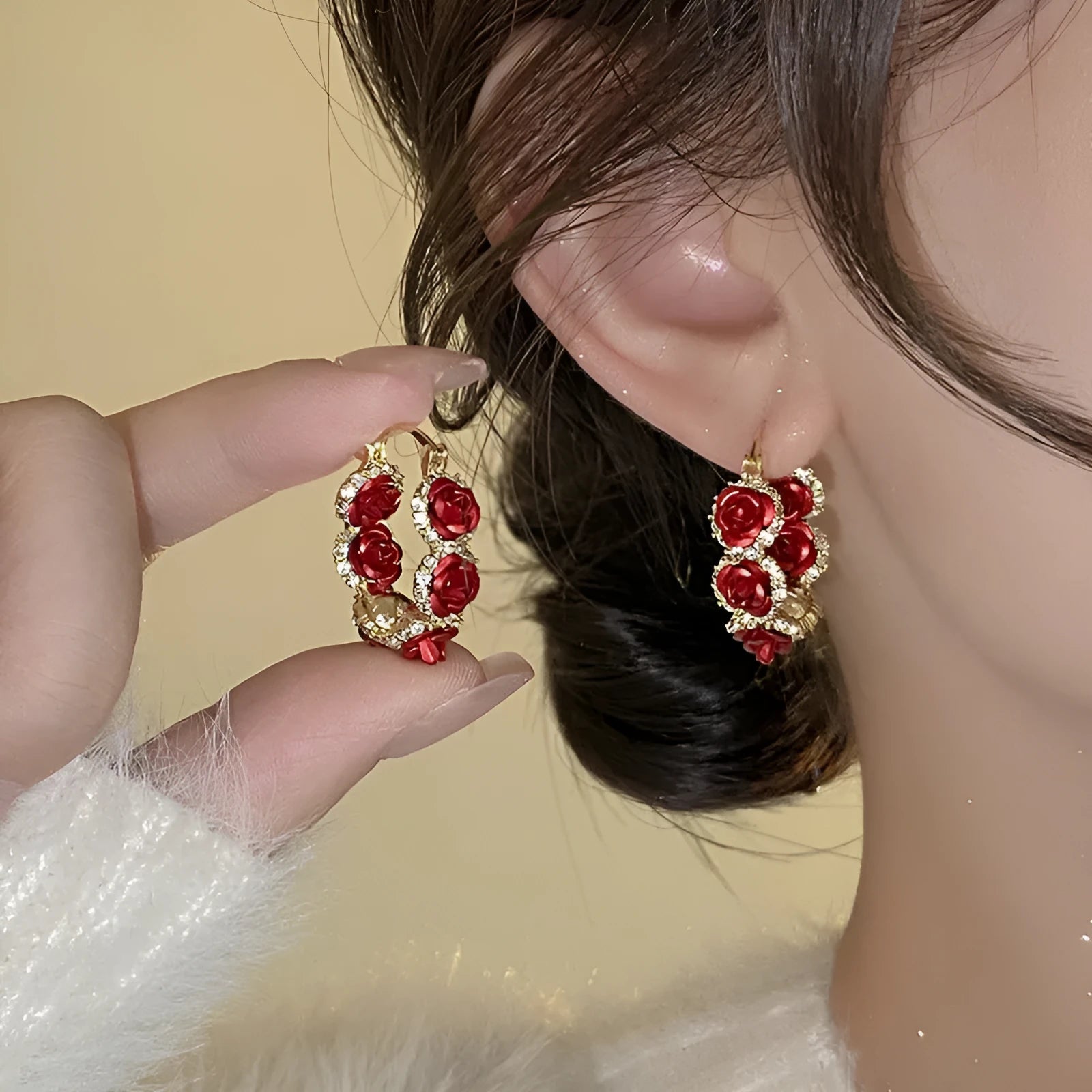 Red floral alloy ear clips with rose design and clip fastening