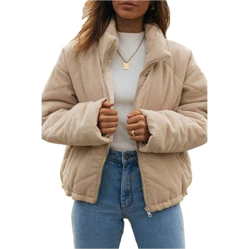 Apricot women's corduroy wadded jacket with a stand collar and front zip.