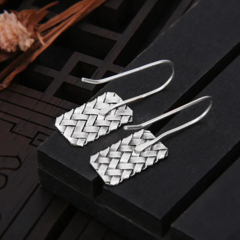 Silver geometric woven diamond plaid earrings measuring 17.5mm by 11mm