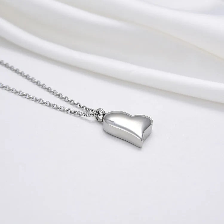 Silver stainless steel curved peach heart pendant necklace with adjustable chain length