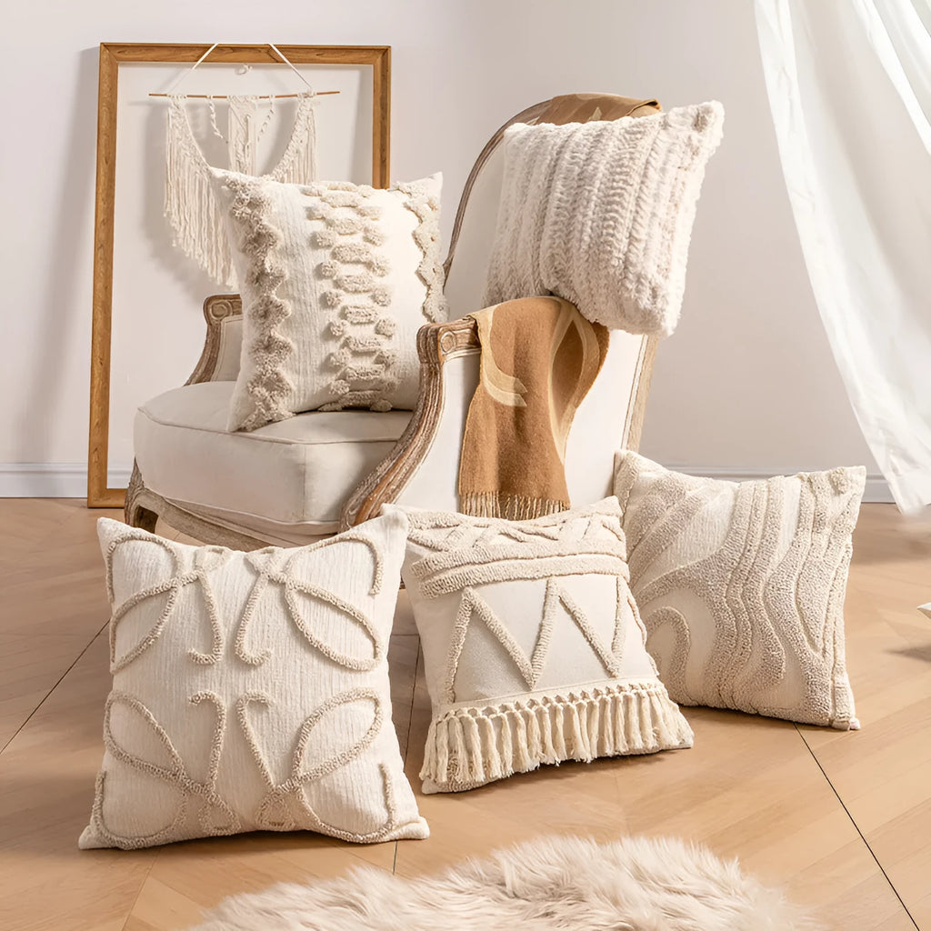 Knitted sofa pillow cover with tassel detailing in spiral dot pattern