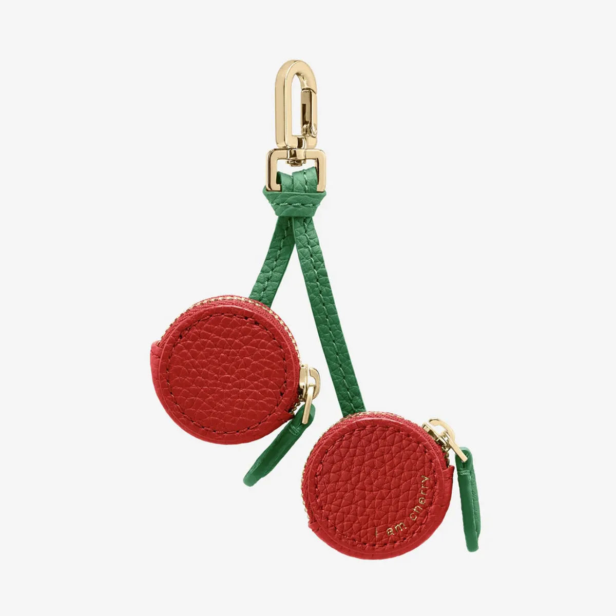Mini solid colour PU leather coin purse keychain in cherry red, blueberry blue, or orange.