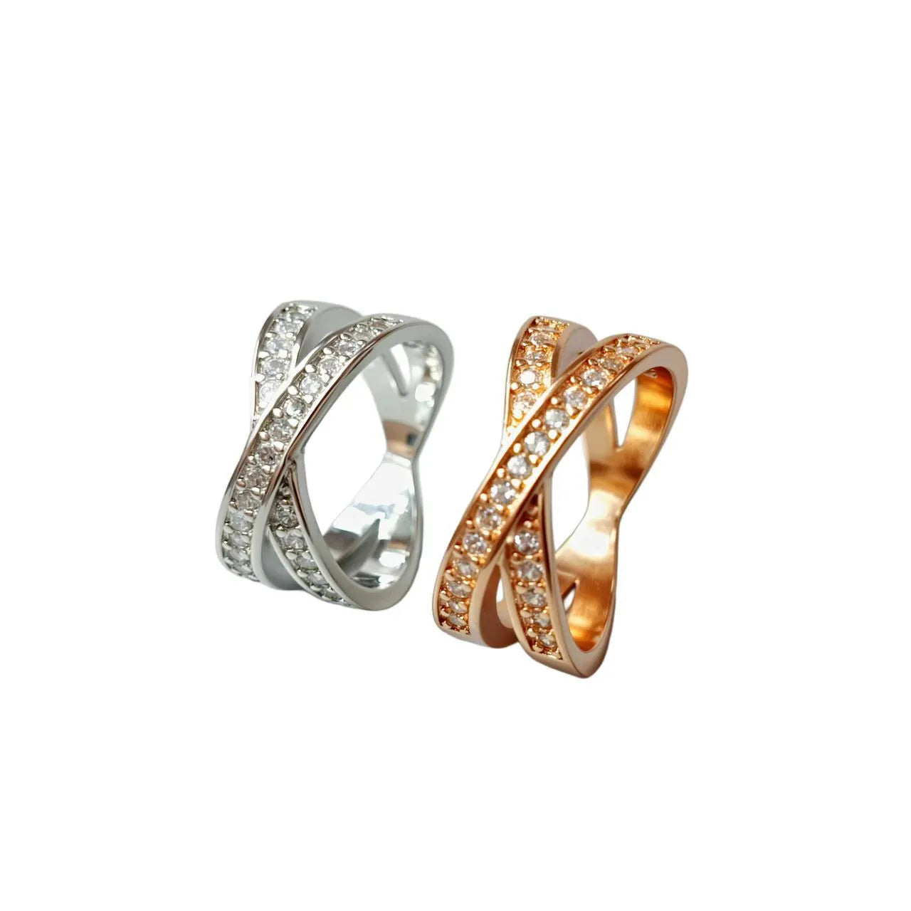 Geometric heart-shaped copper cross ring with micro-inlaid zircon in silver or rose gold finish.